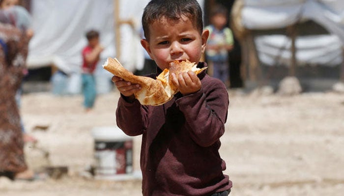 A family receiving food assistance during a mobile distribution event